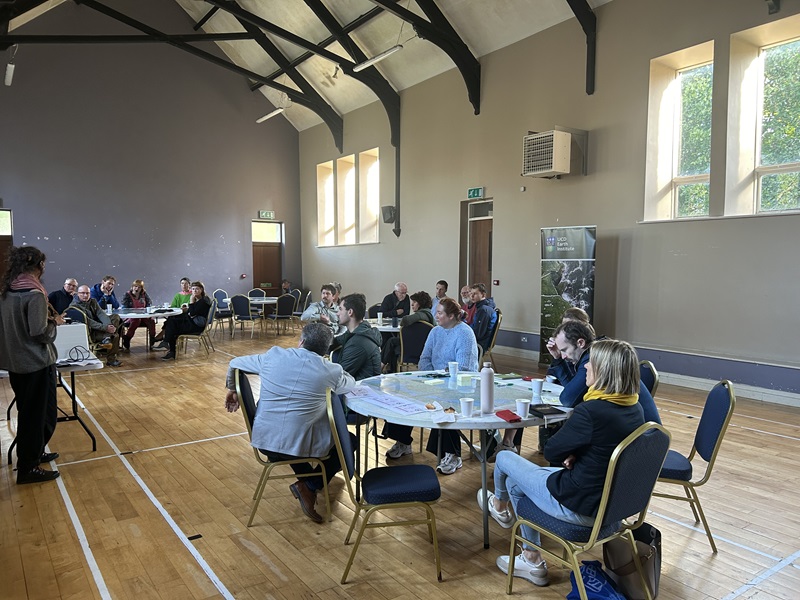 The community centre hall in Kilrush with participants gathered around tables